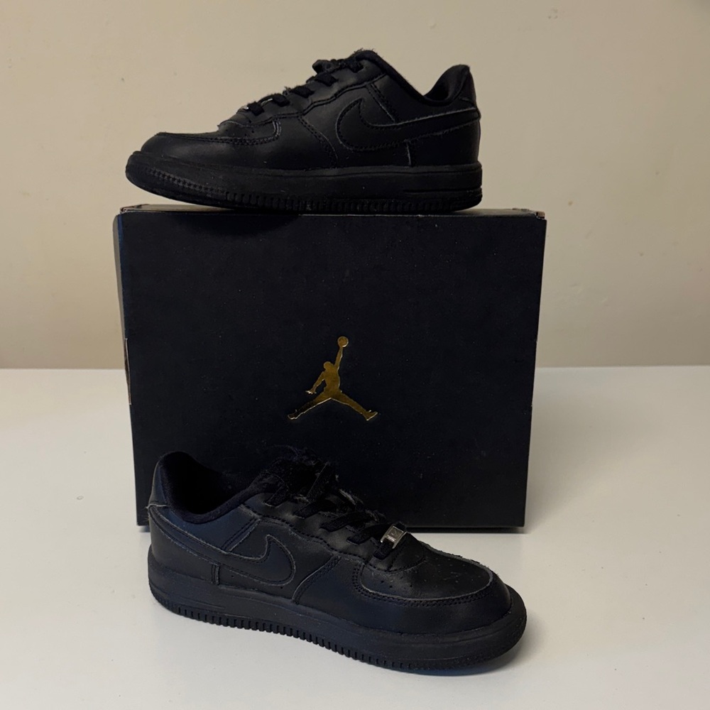 Nike Air Force 1  kid’s All-Black Low Top Sneakers